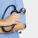 Doctor&rsquo;s hand holding a stethoscope closeup